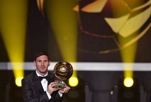 Lionel Messi poses with the Ballon d'Or trophy at the awards ceremony at the Kongresshaus in Zurich on January 7, 2013